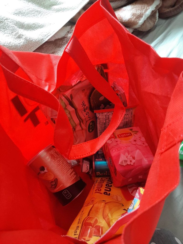 a look inside Sugoi Mart lucky bag full with yummy snacks